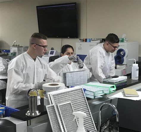 Military Medical Laboratory Technician Conducting a Test