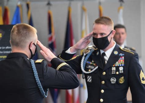 Military Personnel Saluting