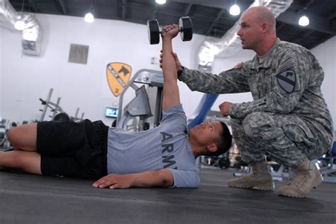 Military Physical Therapist Rehabilitating Patient