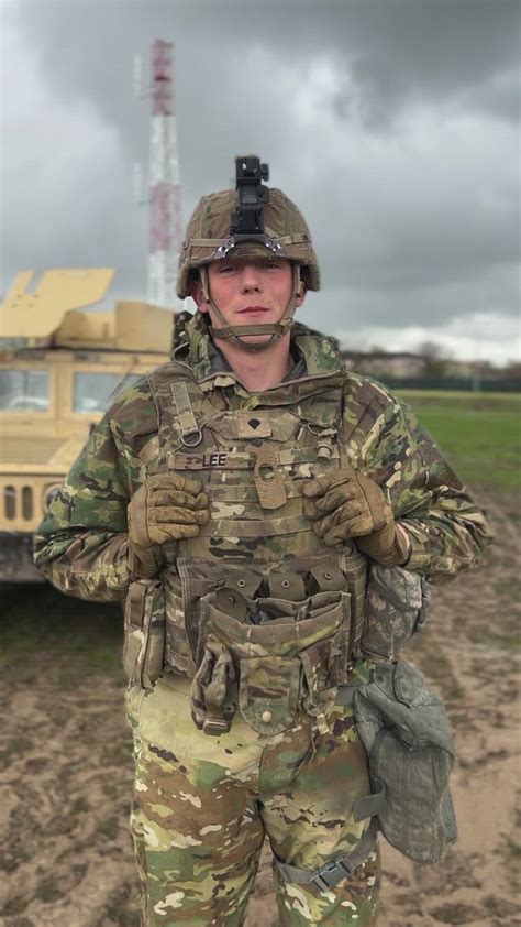 A military police officer directing traffic