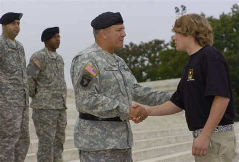 Military recruiter celebrating a new recruit's success