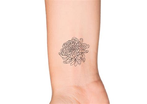 Minimalist chrysanthemum tattoo