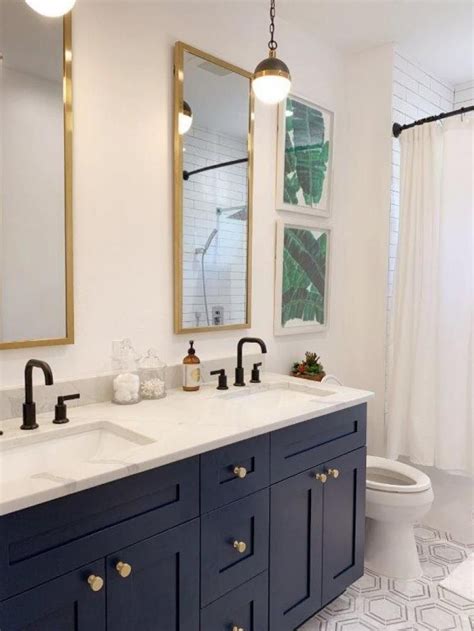 Navy blue bathroom faucets with gold accents