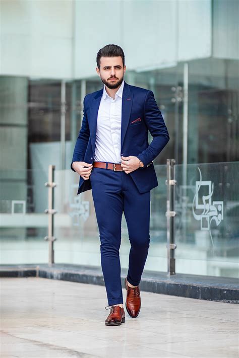 Navy blue suit with white blouse