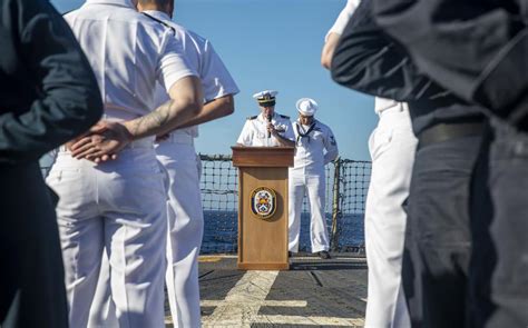 Navy Chaplain Conducting Service