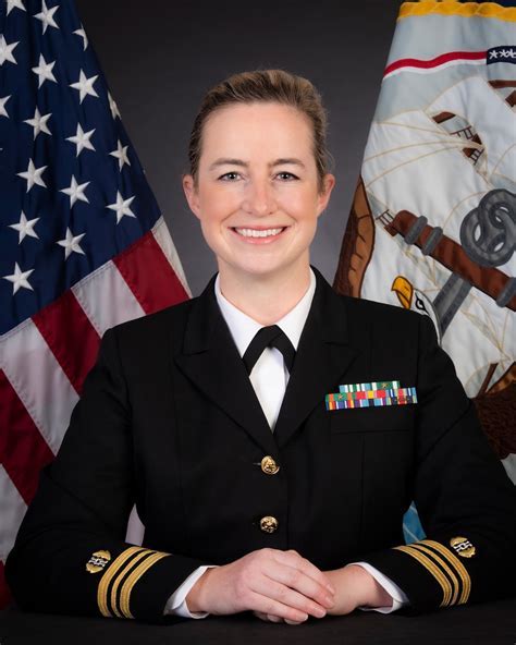 A Navy JAG officer working in an office