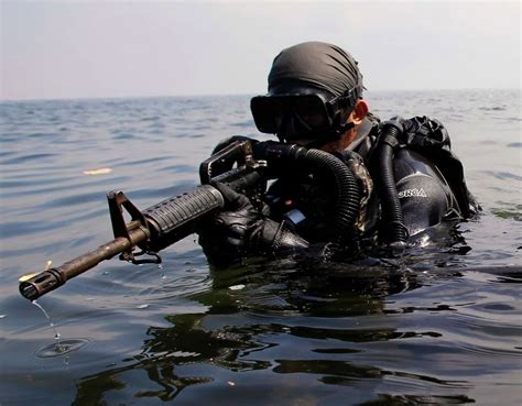 Navy SEALs conducting operations in the field