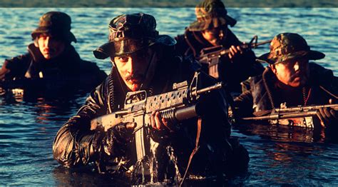 Navy SEALs conducting unconventional warfare operations