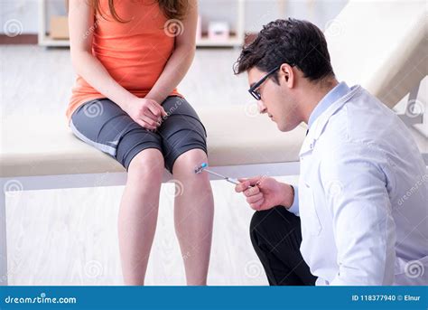 Neurologist examining a patient's reflexes