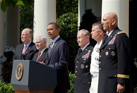 A photograph of Obama meeting with national security officials