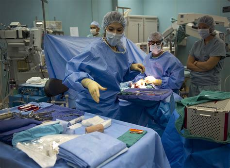 Operating Room Specialist providing patient care