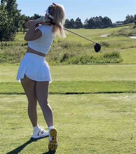 Paige Spiranac in action on the golf course