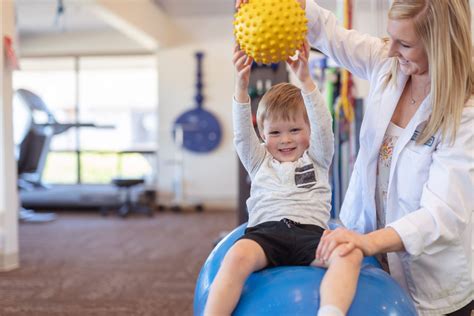 Physical therapists working with pediatric patients