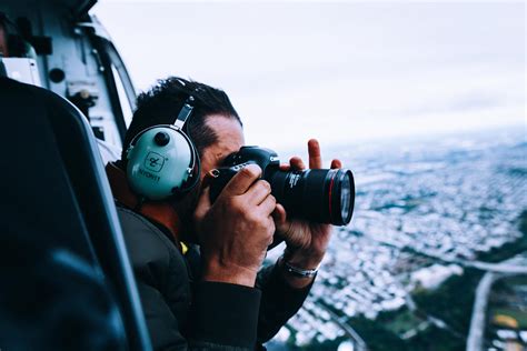 Photographer capturing a sports event at night