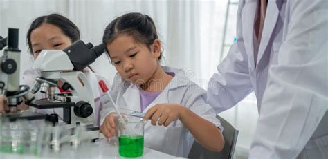 Physical scientists working in a laboratory