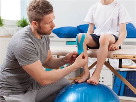 A physical therapist receiving education and training