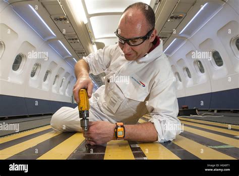 Plane engineer working in a workshop