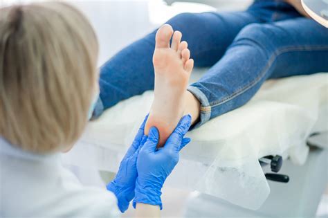 Podiatrist educating a patient