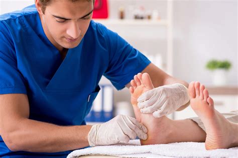 Podiatrist examining a patient's foot