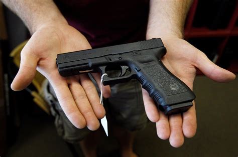 Police officer holding a pistol