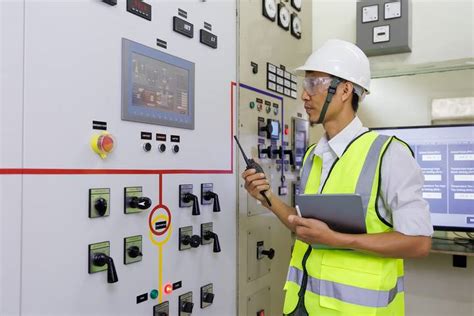 Electricians participating in community involvement activities in a power plant