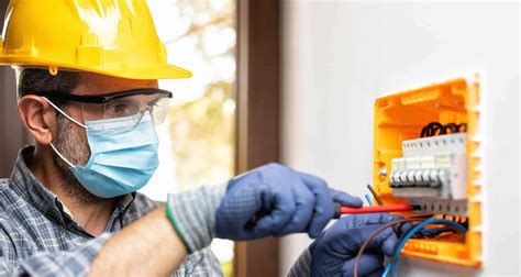 Electricians achieving work-life balance in a power plant