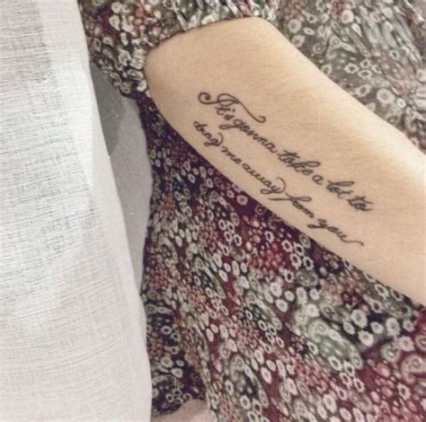 Quote upper arm tattoos