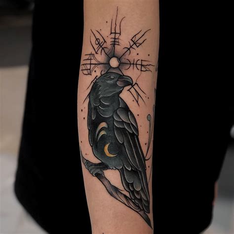 Raven tattoo symbolism and meaning