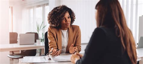 Recruiter taking notes during a meeting