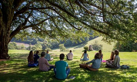 A person meditating on a retreat