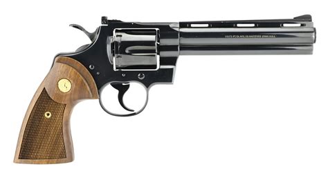 A 45 revolver handgun on a wooden table