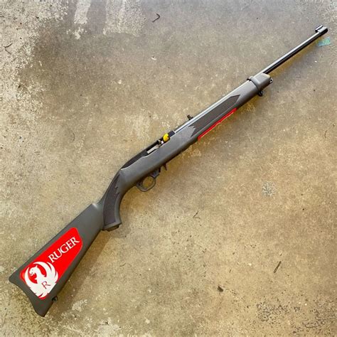 Ruger 10/22 Takedown model with a scope and stock