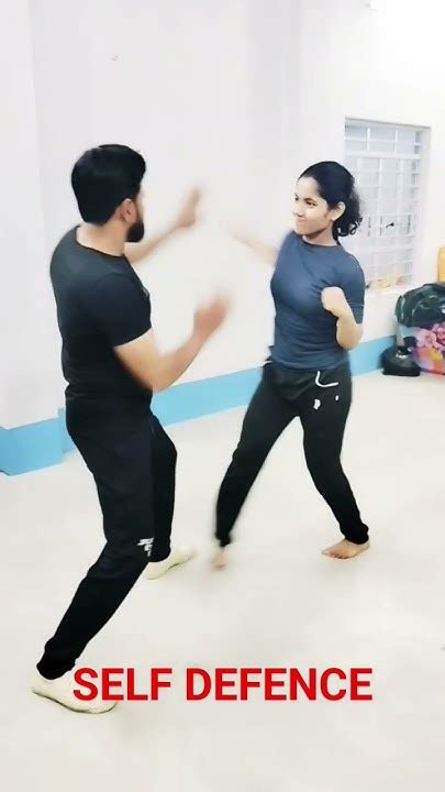 A person practicing self-defense techniques