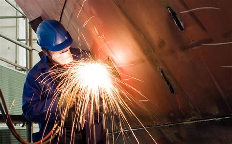 Welder working on a ship