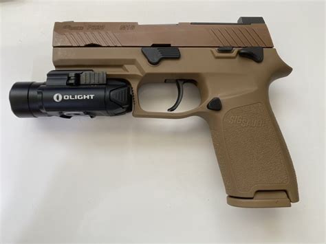 Sig P320 with Olight PL-Mini 2