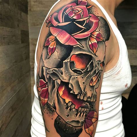 Skull upper arm tattoos