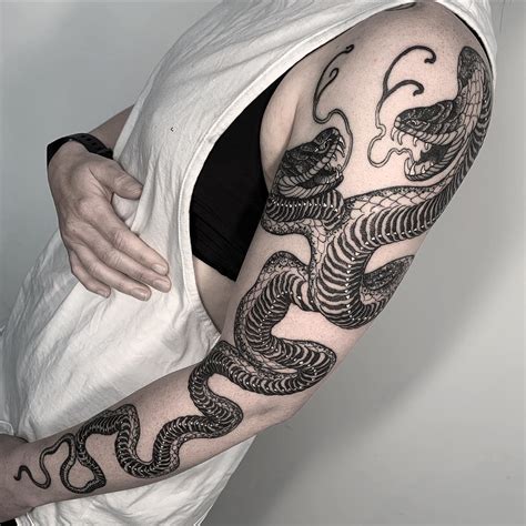 Description of Snake Sleeve Tattoos