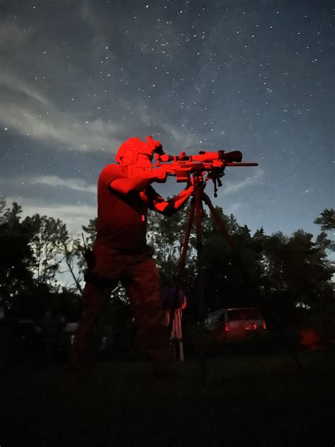 A sniper with night vision goggles in a training exercise