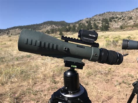 A sniper with a spotting scope in a training exercise