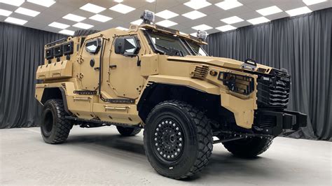 A soldier in a military vehicle