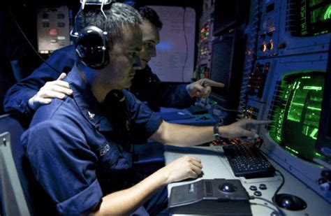 Sonar Technician operating sonar equipment