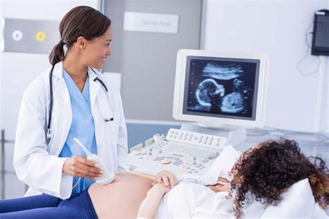 Sonographer with doctor