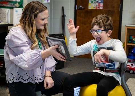 Special education teacher supporting a student