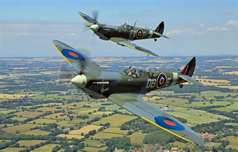 Spitfire flying through the clouds