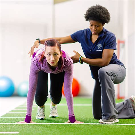 Physical therapists working with sports teams