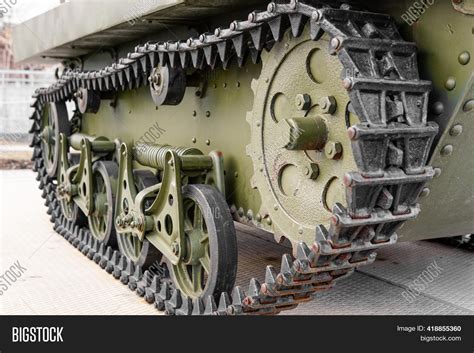 A photo of a tank's tracks, highlighting its weight