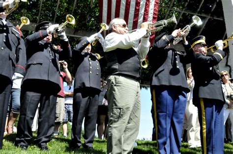 A ceremony with taps being played