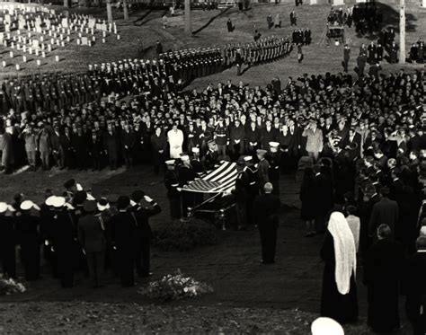 A bugler plays Taps at a presidential funeral