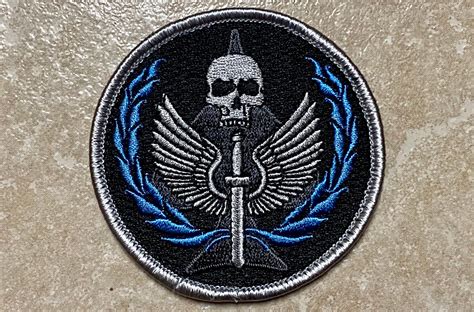 Task Force 141 uniform patch symbolism