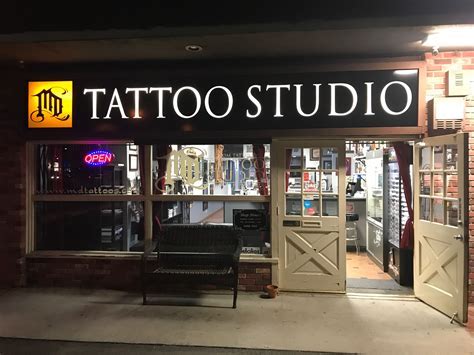 Tattoo artist at work in Northridge